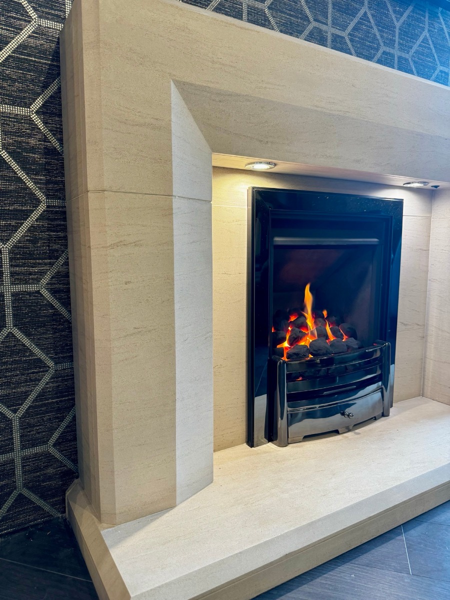 Optica Limestone fireplace with lights