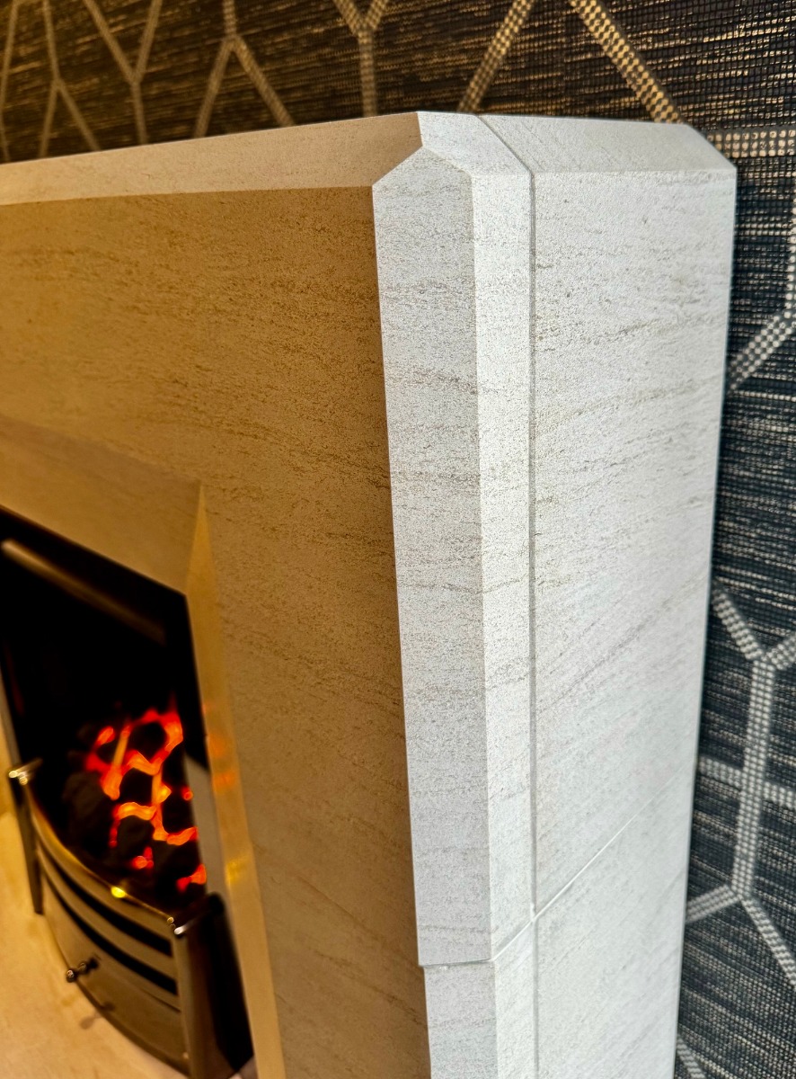Optica Limestone fireplace with lights