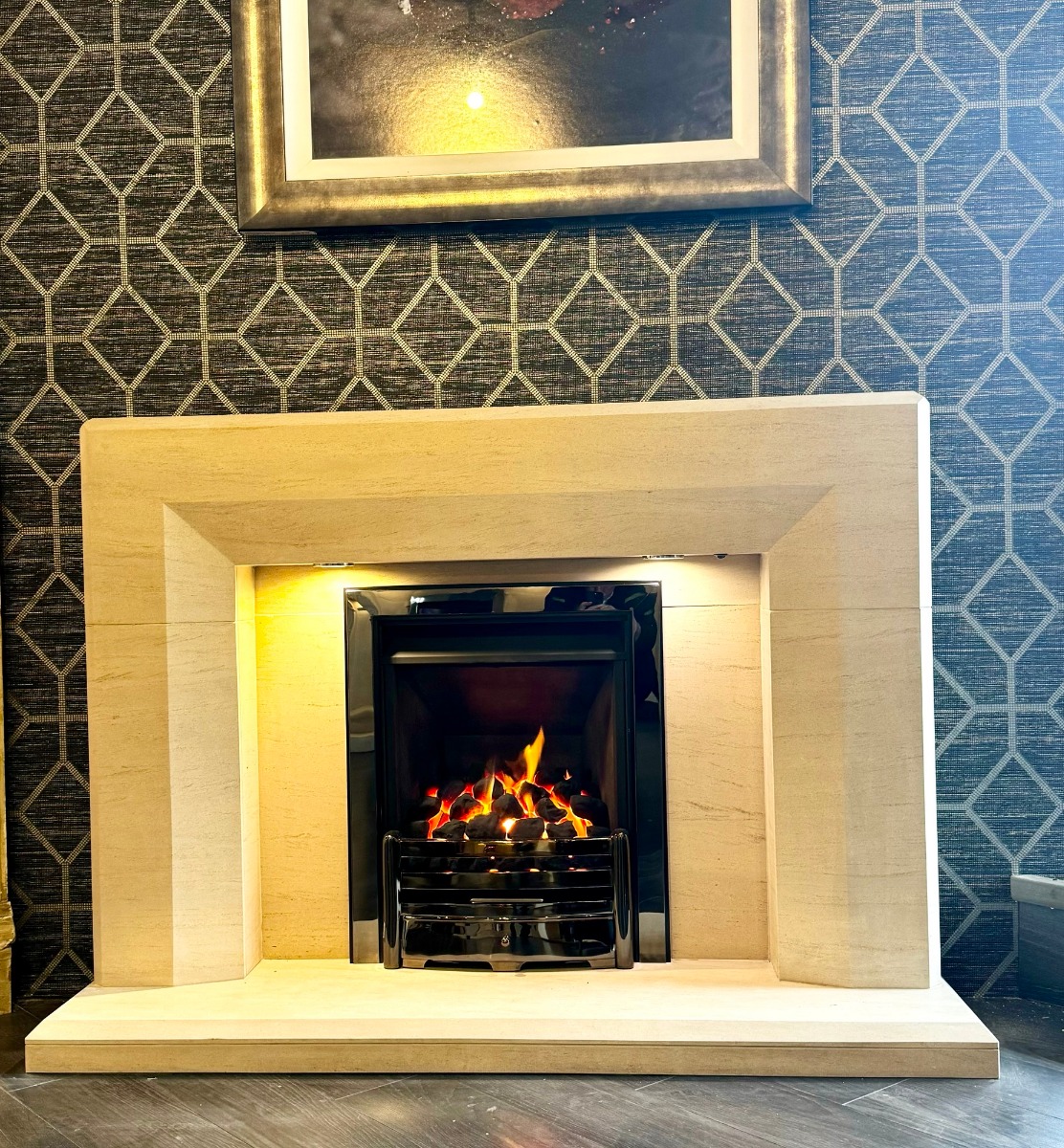 Optica Limestone fireplace with lights