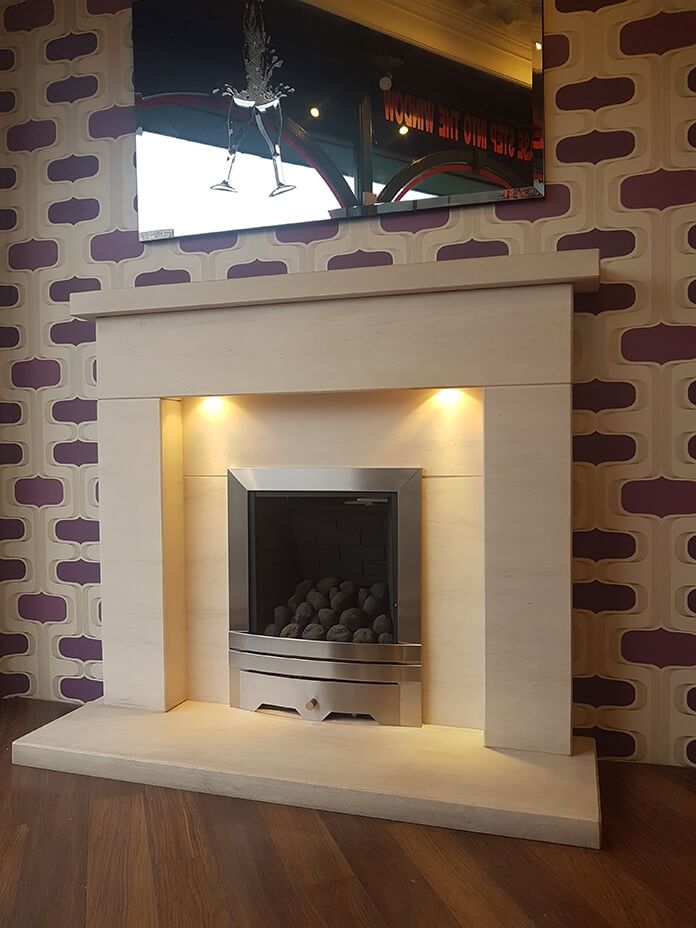 Vaska limestone fireplace
